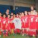 Texas team 03 B St John present Ian St John with their signatures.