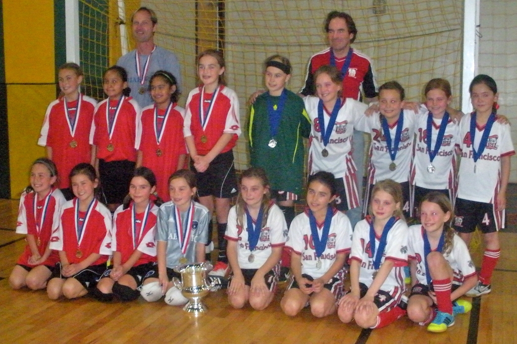 Here are the teary-eyed Ravens trying their best to smile with their silver medals in the post-game medal ceremony. 