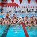 girls swim team in pool