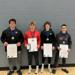 Sam Diozeghy, Cooper Rowe, Jack Nelson and Cole Munsterteiger pose with their brackets and first-place medals.