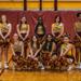Minneapolis Roosevelt Basketball Cheerleading squad pose on the court at Jack Wells Gymnasium