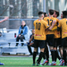Guelph United players celebrate scoring