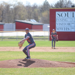 Senior Cole Munsterteiger pitching