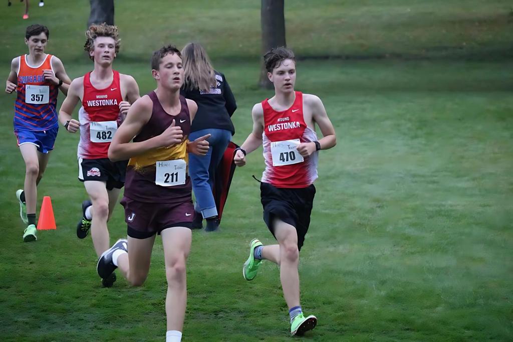 Gabe Lundgren and Jacob Chilson running