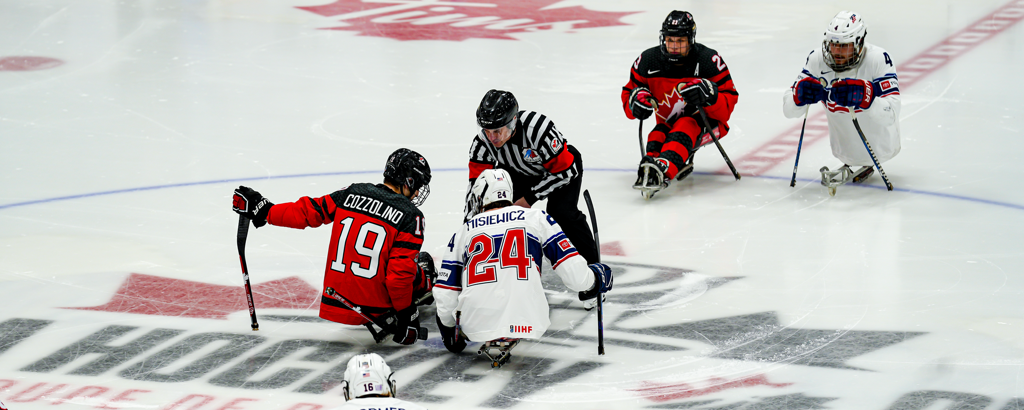 Team USA forward Josh Misiewicz looks to take the opening faceoff versus Team Canada.