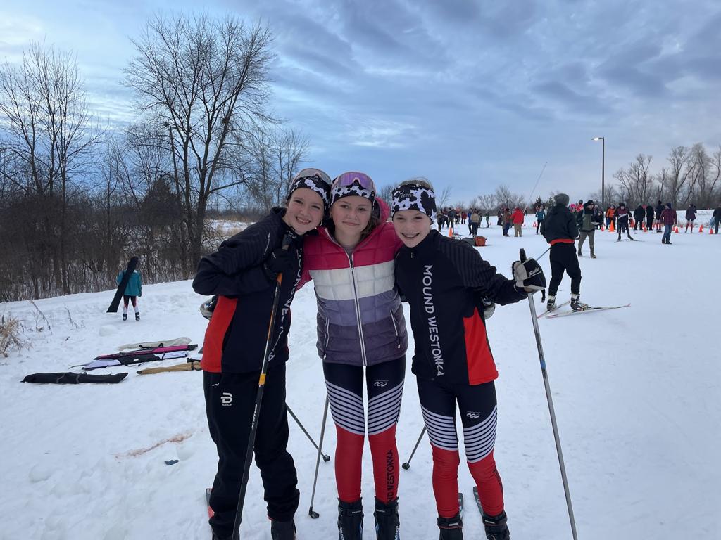 Three girls Nordic skiers