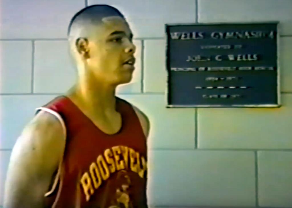 Minneapolis Roosevelt alumn John Thomas during an interview in the hallway of Jack Wells Gymnasium