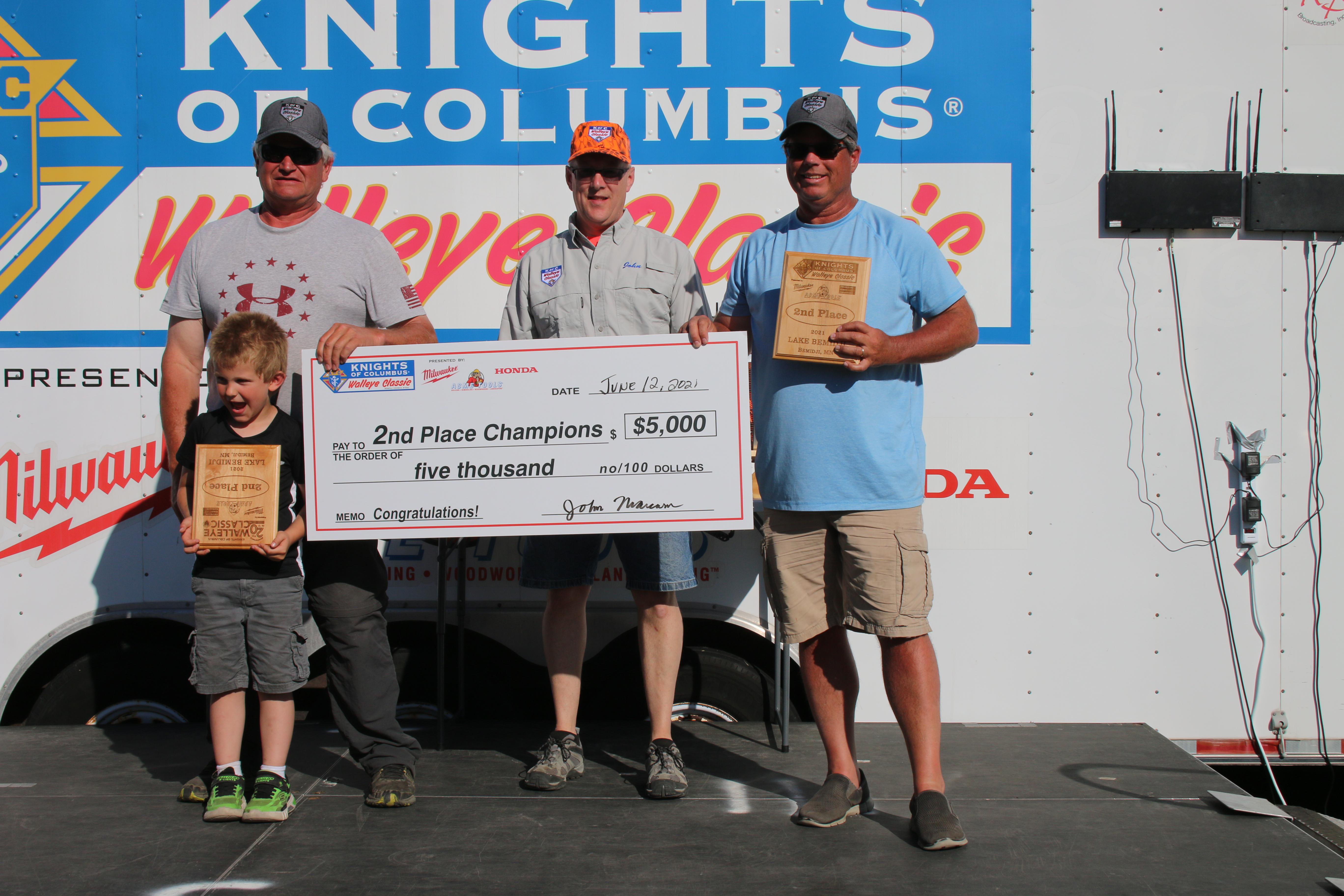 Paul Schummer, KCWC Chairman John Marcum, Mike Amble and their little helper